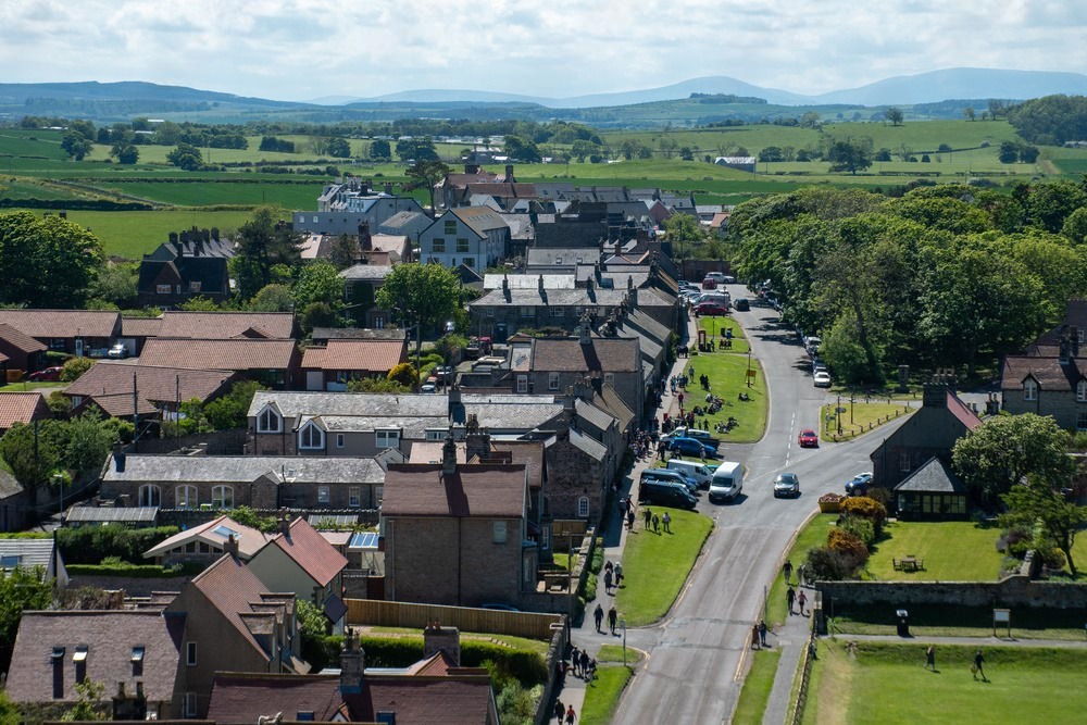 Aerial view of picturesque village landscape listed by Spartan Property Estate Agents.
